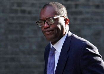 UK’s Kwarteng rushes to London for crunch talks on tax U-turn